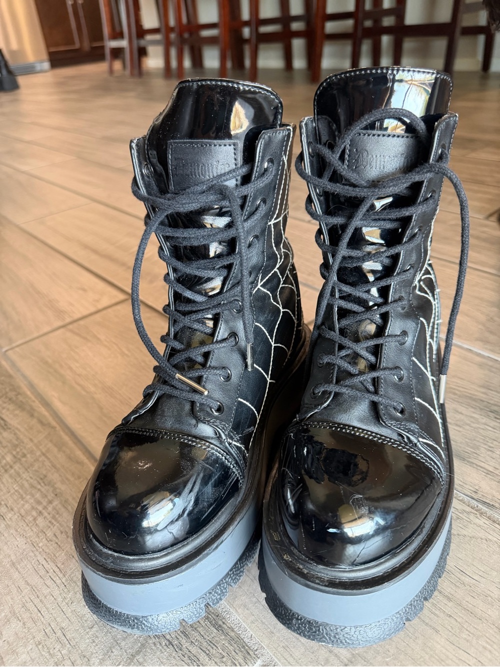 Demonia Black Lace-Up Platform Boots with Spiderweb Stitching
